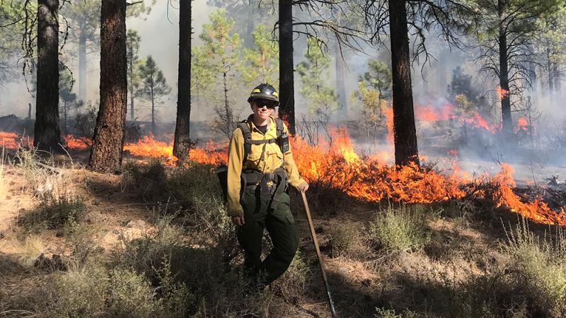 Katie Sauerbrey of The Nature Conservancy monitors a controlled burn.