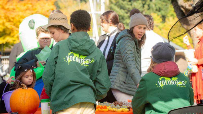 volunteers tabling at fall event