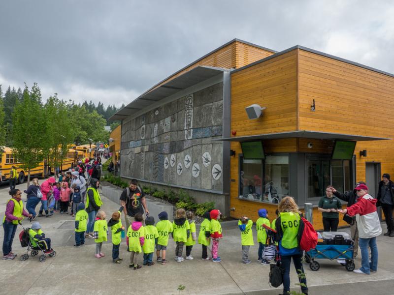 School kids line up outside the zoo
