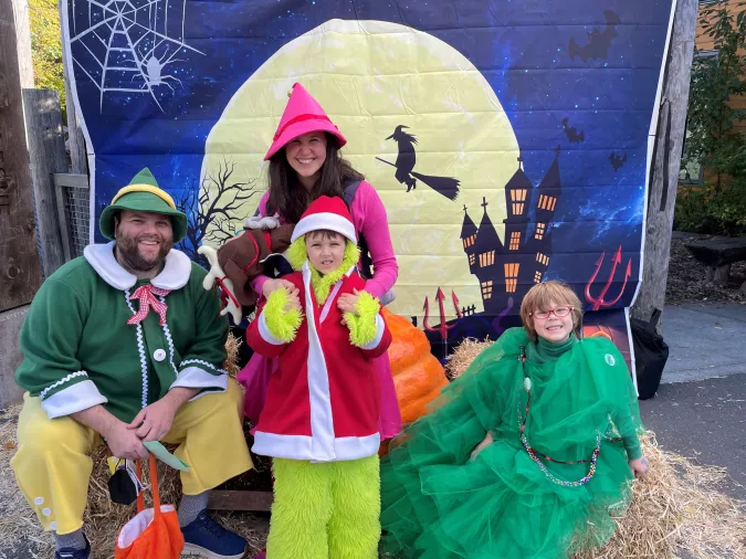Family dressed as various Christmas movie characters 