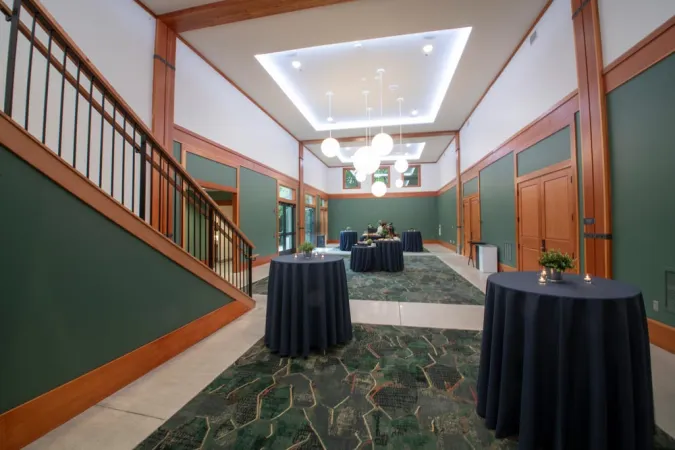 Cascade Crest Ballroom lower lobby with high tables